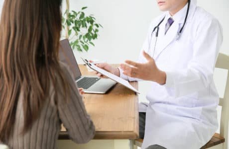 Doctor talking with a patient